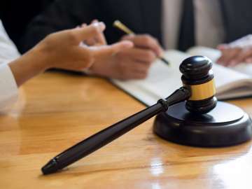 Business lawyer judge working about legal legislation Consultati